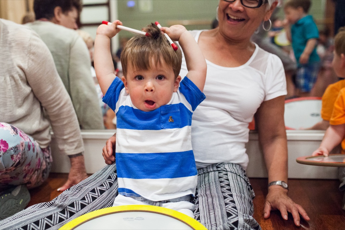 Toddlers and caregivers in a Rockness Music class